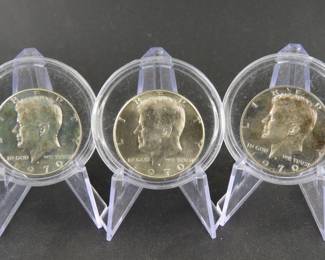 Lot 32. Three 1970 40% Silver Kennedy Half Dollars. Two appear to be proofs