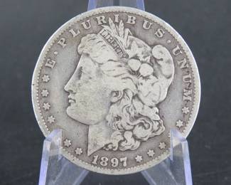 Lot 67. 1897 O Morgan Silver Dollar