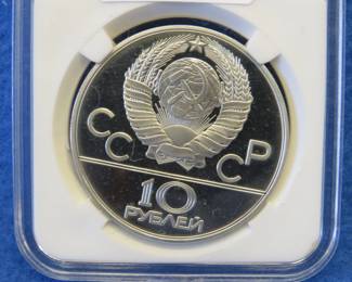 Lot 297. USSR 1980 Olympic 10 Ruble coin contains .999 silver and weighs .96 oz. Notwithstanding the label, minted in the USSR.
