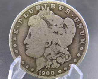 Lot 303. 1900 O Morgan silver dollar