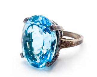 Sterling Silver Ring with Oval Blue Topaz Gemstone