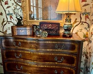 Fabulous English inlaid chest of four drawers in flame mahogany