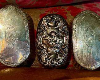 Set of three antique sterling “shoulder brushes” from the 1800s to the early 1900s.