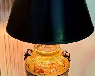 Chinese Wucai porcelain jar to lamp from the Qing Dynasty (1644–1911). Wucai, meaning "five colors," refers to the vibrant polychrome enamel decoration. The jar depicts scenes with figures, possibly warriors or immortals, and traditional motifs symbolizing longevity and good fortune