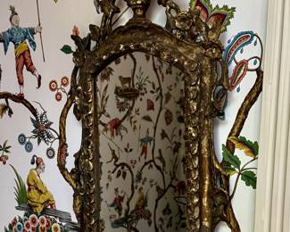 A stunning pair of carved gilt wood Italian mirrors