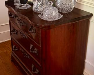 A Victorian period genuine rosewood chest or dresser from about 1860 has a shaped marble top and hand carved pulls. AMAZING!