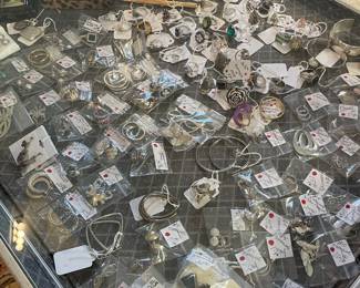 Sterling earrings and sterling rings with gemstones No sterling jewelry left on Premises. Will be brought back in the day of the sale