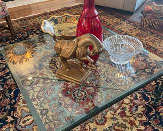 Wonderful iron glass top coffee table with large Art glass vase and horse sculpture