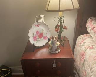 One of two cherry drop leaf nightstands