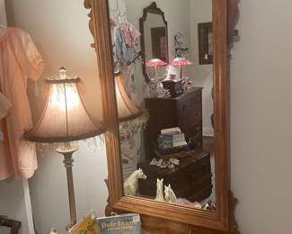 Walnut federal mirror
On chest is a collection of Breyer horses and vintage children’s books