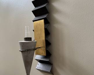 Mixed elements sconce