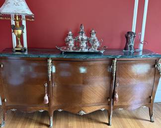 Bombe style sideboard