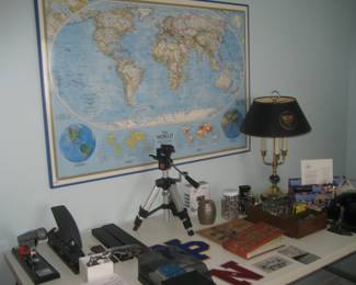 Framed world map, office supplies, tripod, accent lamp, athletic team letters