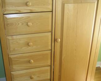 Small wood cabinet with drawers and shelves