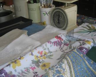 Table linens, scale, and Royal Copenhagen utensils