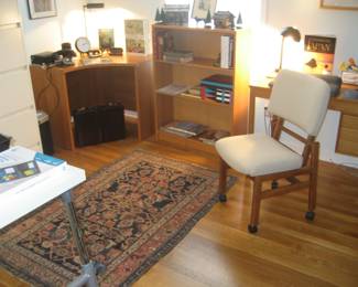 Corner desk, bookcase, small wood desk, collapsible chair, Persian rug