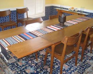 Teak dining table extended, 8 teak chairs by Funder-Schmidt & Madsen, wool area rug