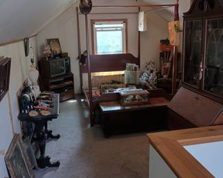 Upstairs bedroom featuring a wide variety of Antiques, Christmas, Children toys and books