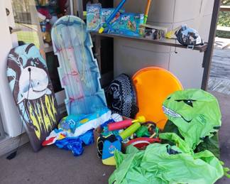 sleds, boogie board, pool toys