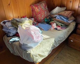 Another one of the twin beds. More textiles and linens.