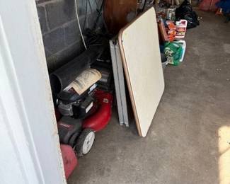 Lawnmower- was used over a year ago and then she decided on a lawn service. Folding table and card table.
