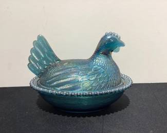 Carnival hen on nest