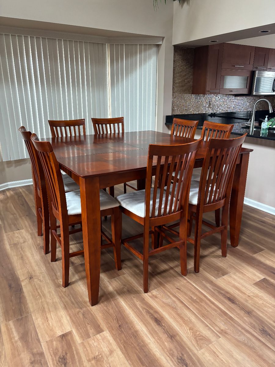 Dining table. Shown with lead in it. In excellent shape. Has pad for top-included. Also several tablecloths made to fit table.