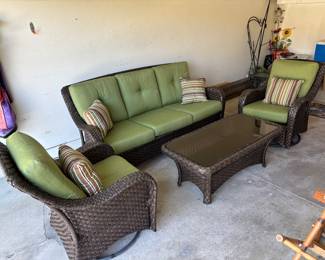 Beautiful 4 pc outdoor patio set with cushions. Cushions have been kept inside. Coffee table has glass top.