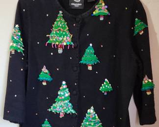 $100 Michael Simon the creator and pioneer of the ugly Christmas sweater since 1976 size large 21 inches armpit to armpit 