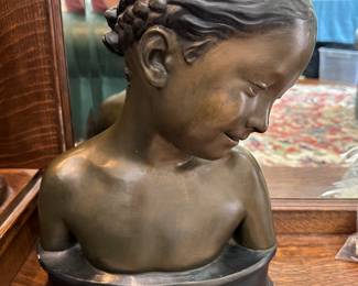 Bust of a young girl - This is not Bronze, It is heavy and has been painted to look bronze