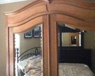 This is an antique armoire - Please view additional photos for a photo of it assembled
