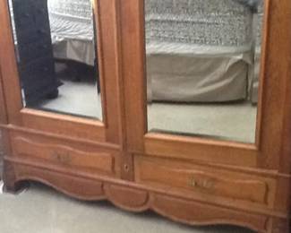This is an antique armoire - Please view additional photos for a photo of it assembled