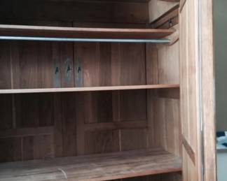 This is an antique armoire - Please view additional photos for a photo of it assembled