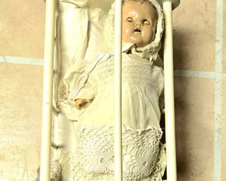 Antique Doll in Cradle