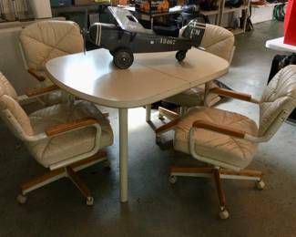 Vintage Dining Table w/Caster Swivel Chairs
