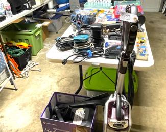 Shark upright vacuum plus all accessories including Shark canister caddy.