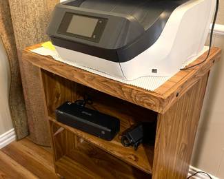 HP office copier, fax, scanner printer. Epson portable printer.