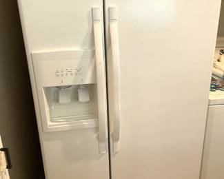 Westinghouse side by side refrigerator/freezer.