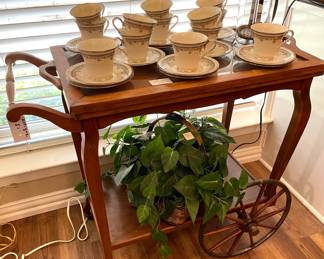 Antique tea cart with removable top tray.