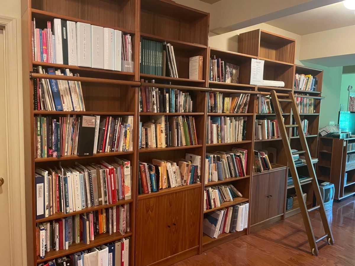 Scan book cases with library ladder with lots of books!!