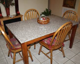 granite-top breakfast table and four chairs