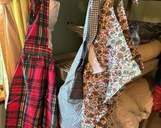 SEVERAL HANDMADE APRONS