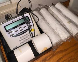 Weather radio, adding machine paper
