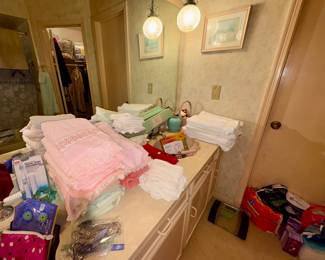 Vintage and newer towels, bathroom Accessories’s, soap’s, nail care products, curling irons, make up bags