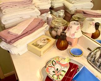 Towels, soaps, oil lamp, makeup bags,