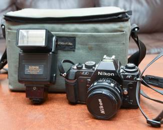Retro Nikon N2020 With Carrying Case And Sunpak Auto 433 AF Speed Light