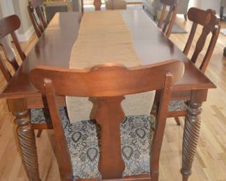 Ethan Allen Dining set with two leaves 6 chairs and table protectors
