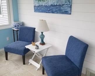 Arm chair; tables; table lamps