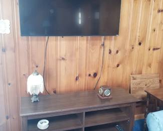 Flat screen TV with wall mount; entertainment stand