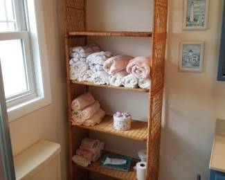 Wicker etagere; bath towels